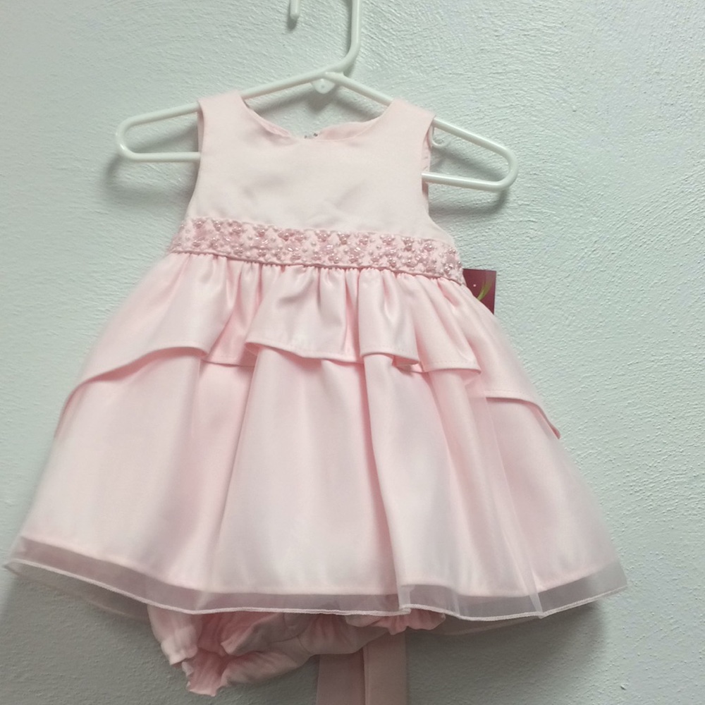 Pink dress new with tags 6 to 9 months